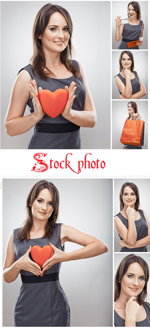 Business woman hold red heart - stock photo