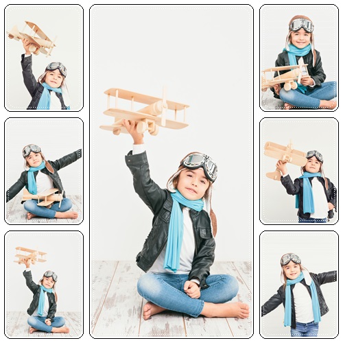Small boy with plane - stock photo
