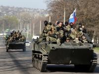 На Донбассе броневик боевиков расплюснул авто с миролюбивыми жителями